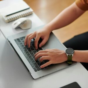Devops Engineer Working on Laptop